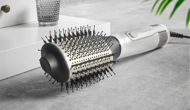 Hair dryer brush on dressing table