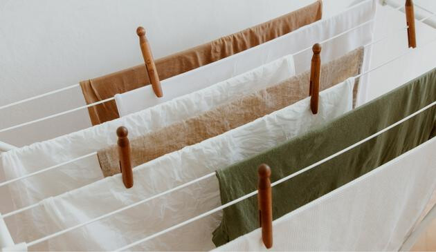 A picture of clothes drying on an airer.