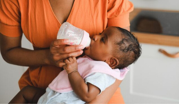 Mother feeding baby