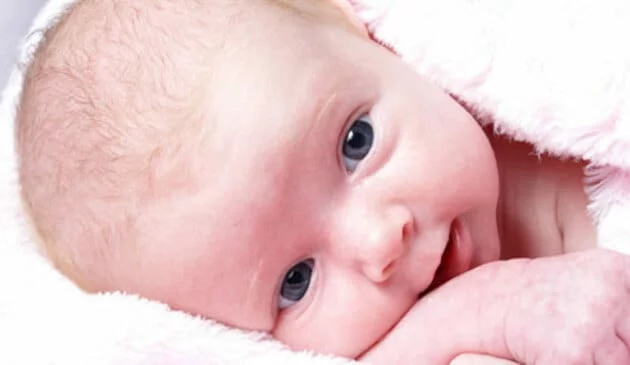 Close up of new born baby face