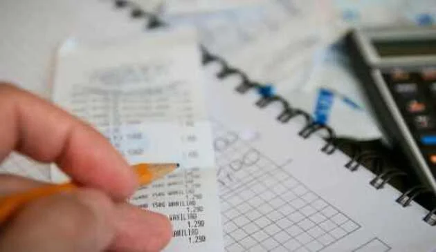 Pencil and bills