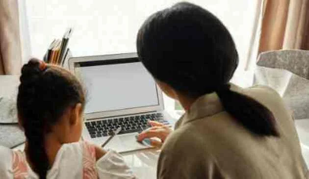 A mother and daughter studying together