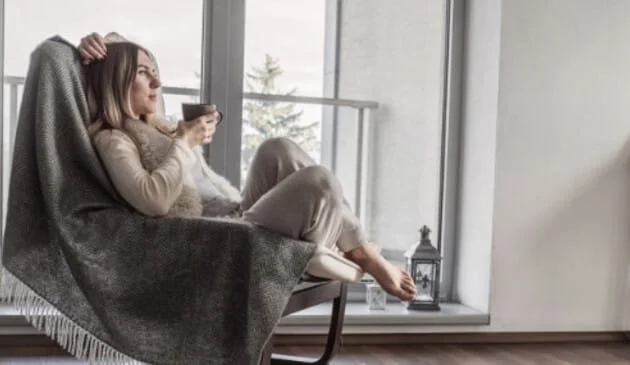 woman sat on chair